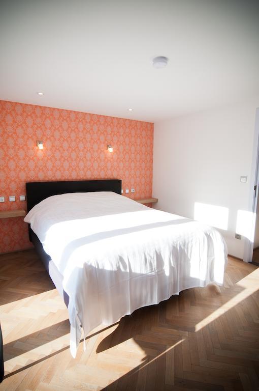 Apartment De Maasnacht Maaseik Quarto foto